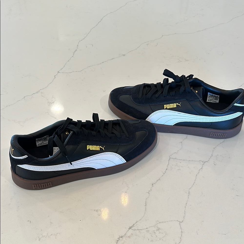 Puma Black and White Sneakers-**New Never worn without tags and box**